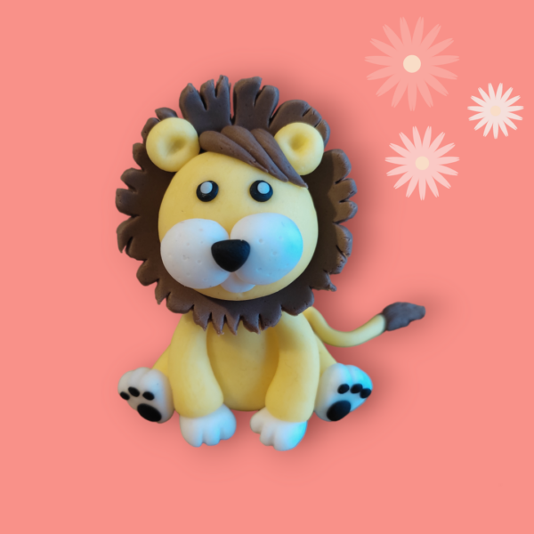 Personnage de décoration à poser sur un cake design représentant le roi de la savane, à savoir le lion.